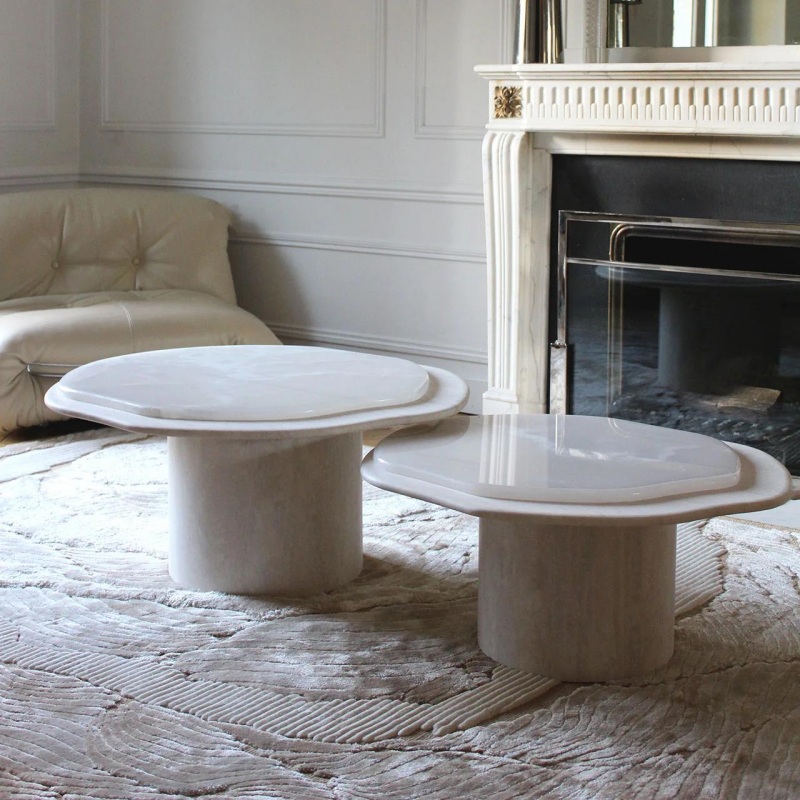 Nesting White Onyx Cloud Coffee Tables next to fireplace - luxury living room decor