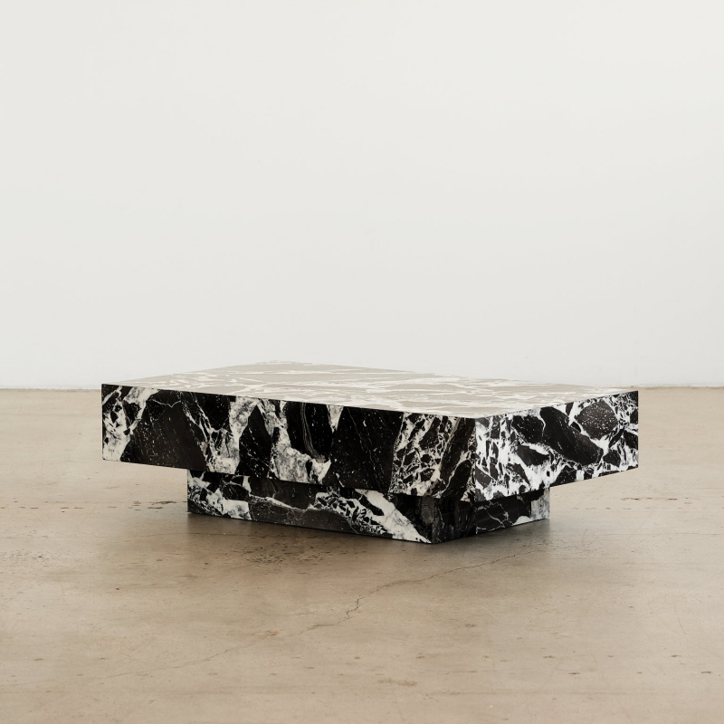 Two-tier black marble coffee table with contrasting veining - sculptural modern living room accent