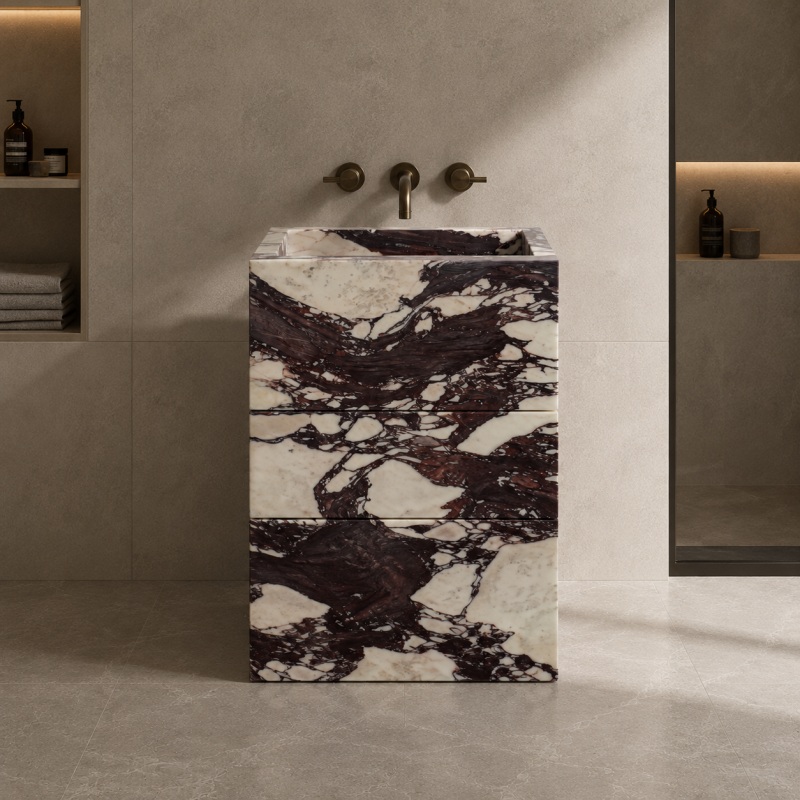 Cube-shaped Calacatta Viola stone vanity cabinet with open drawers, natural marble matching drawer wrap