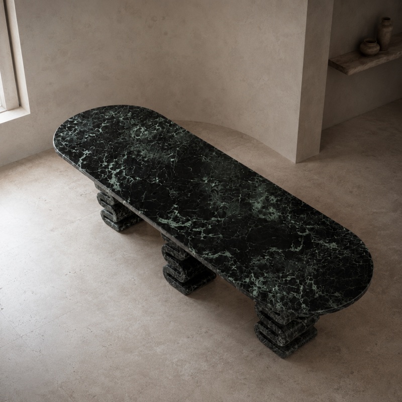 Architectural wavy stacked dark green marble dining table with soft rounded oval tabletop